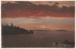 A low wooded promontory protrudes toward the right in the left middle distance. Boulders are shown in the right foreground. Hilly coast in rear. A dark reddened cloud bank stretches across the sky, the ocean below.